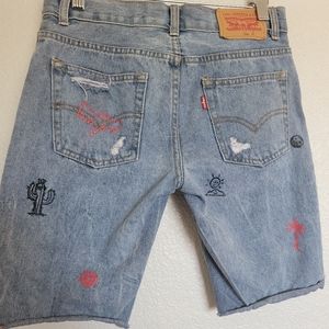 Levis men's 511 size 27 cutoff shorts with graffiti style art